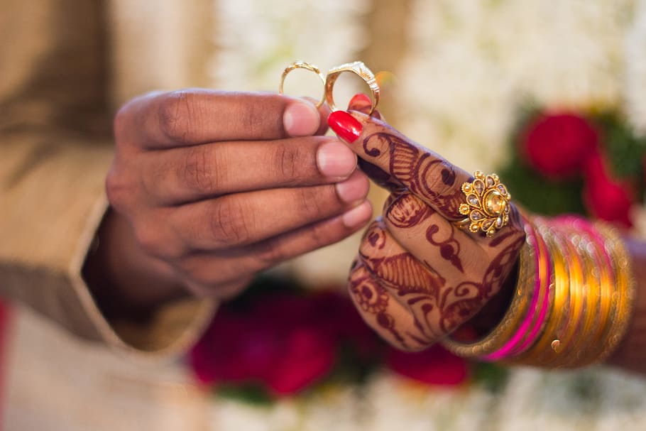 Man and Woman Holding Wedding Rings, bracelets, bright, celebration