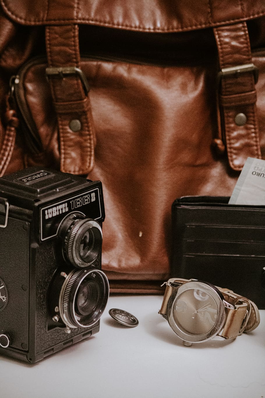 black vintage camera, briefcase, bag, electronics, wristwatch HD wallpaper