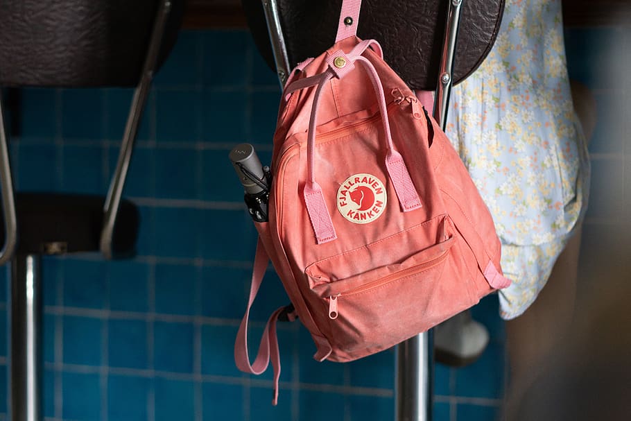 pink and white backpack, chair, bokeh, blue, hang, blur, hanging HD wallpaper