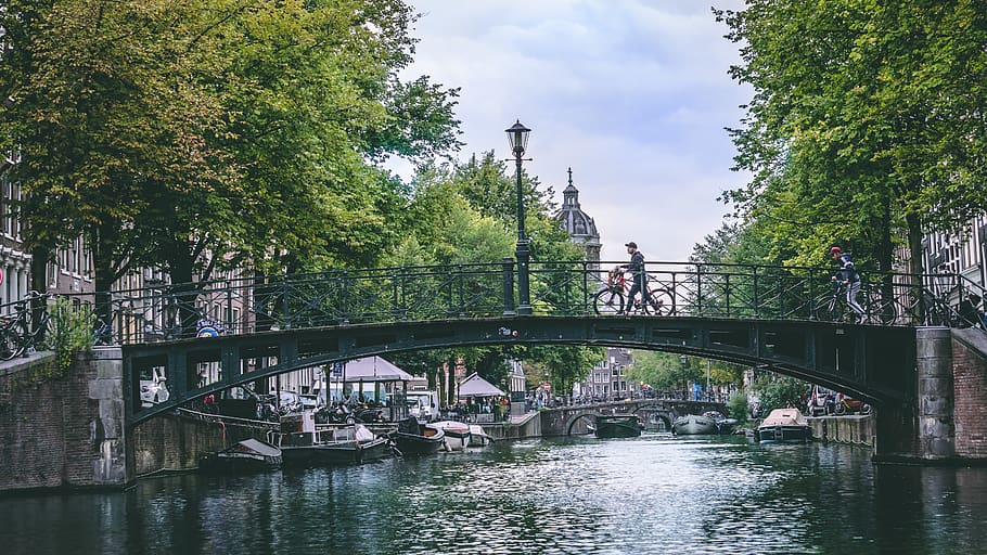 Person Crossing The Bridge, amsterdam, architecture, canal, city HD wallpaper