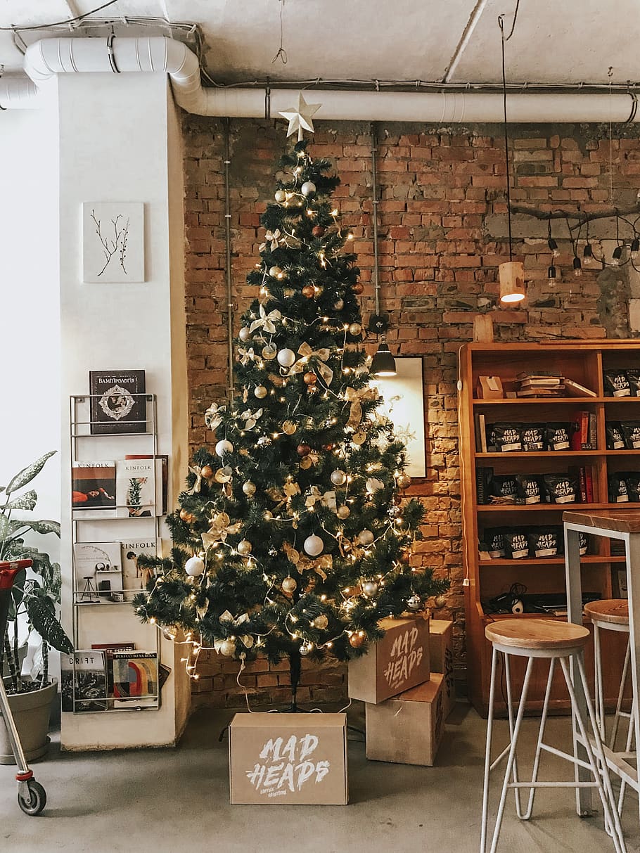 Green and Gold Christmas Tree Near Boxes Inside Room, books, brickwall HD wallpaper