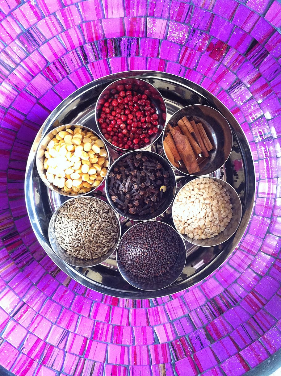 food background, spices and herbs for cooking tasty dishes. various  seasonings scattered on table. Stock Photo | Adobe Stock