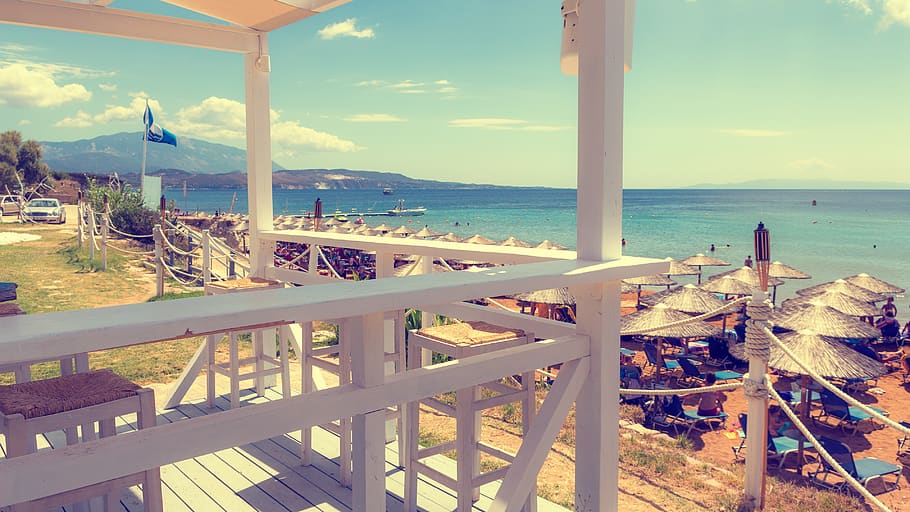 greece, xi beach, sun, holiday, water, sea, sky, railing, nature HD wallpaper
