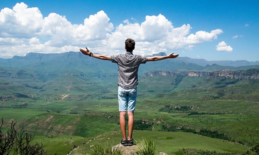 Man Wearing Grey Shirt Standing on Elevated Surface, clouds, fashion HD wallpaper