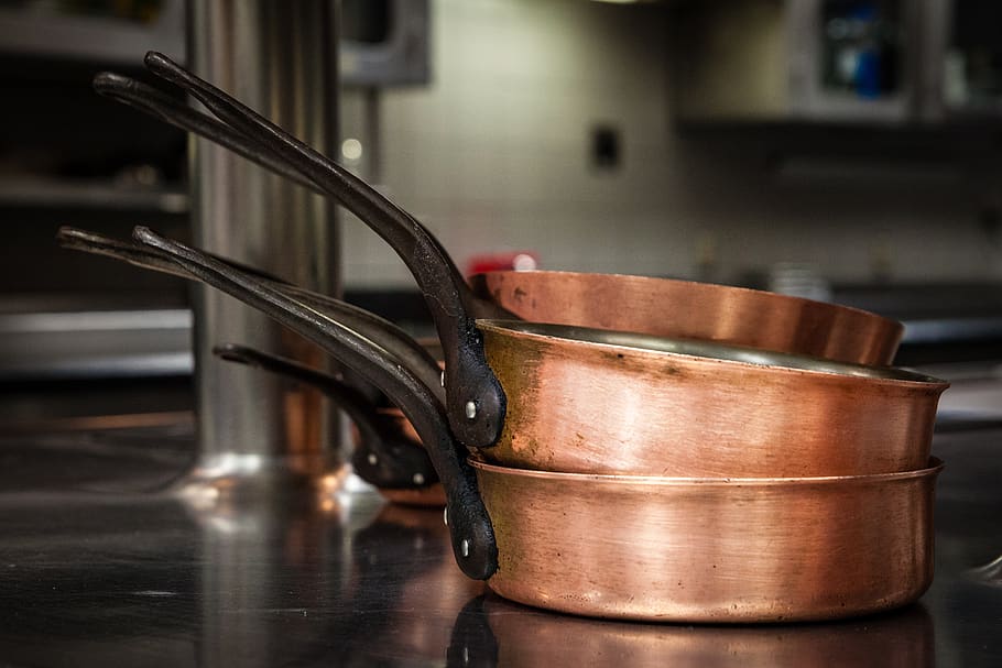 three brass colored cooking pans, household equipment, indoors HD wallpaper