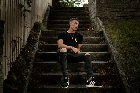 HD wallpaper: man sitting on concrete stairs, person sitting on arena ...
