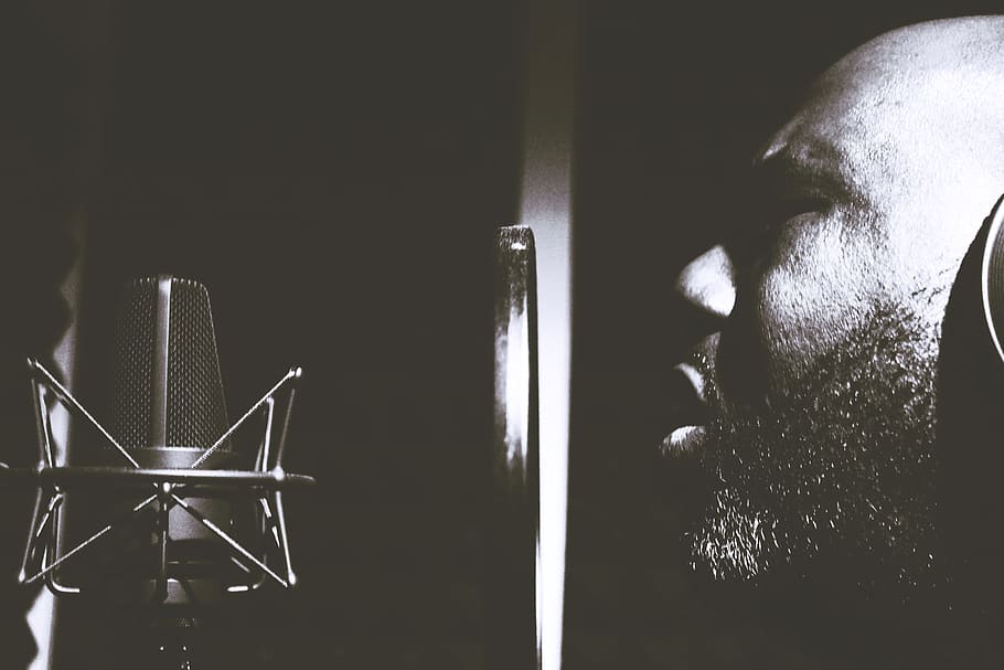 Man Singing Near Pop Filter and Condensing Microphone, backlit HD wallpaper
