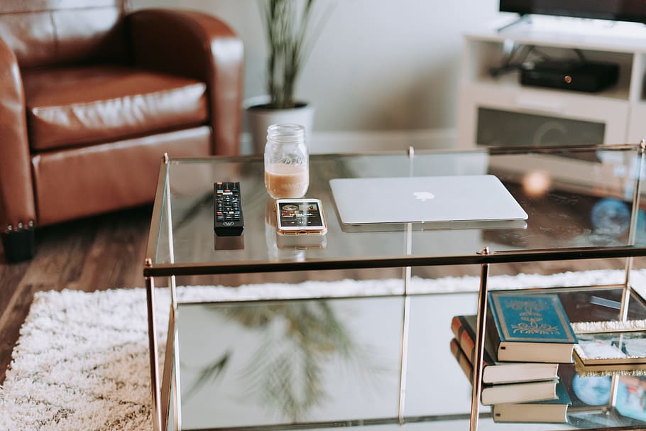 remote control on center table, laptop, computer, tech, technology HD wallpaper