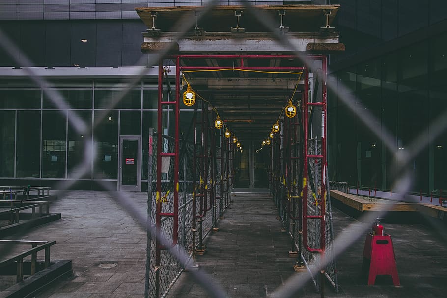 pathway underneath scaffolding, the way forward, illuminated HD wallpaper