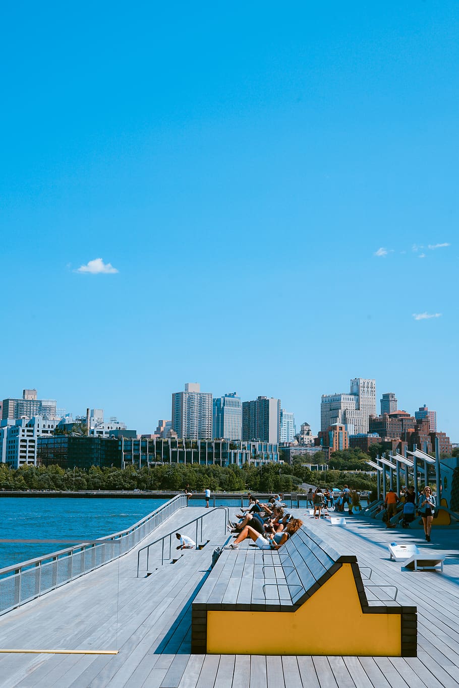 people laying on bench, blue sky, person, skyscraper, skyline HD wallpaper