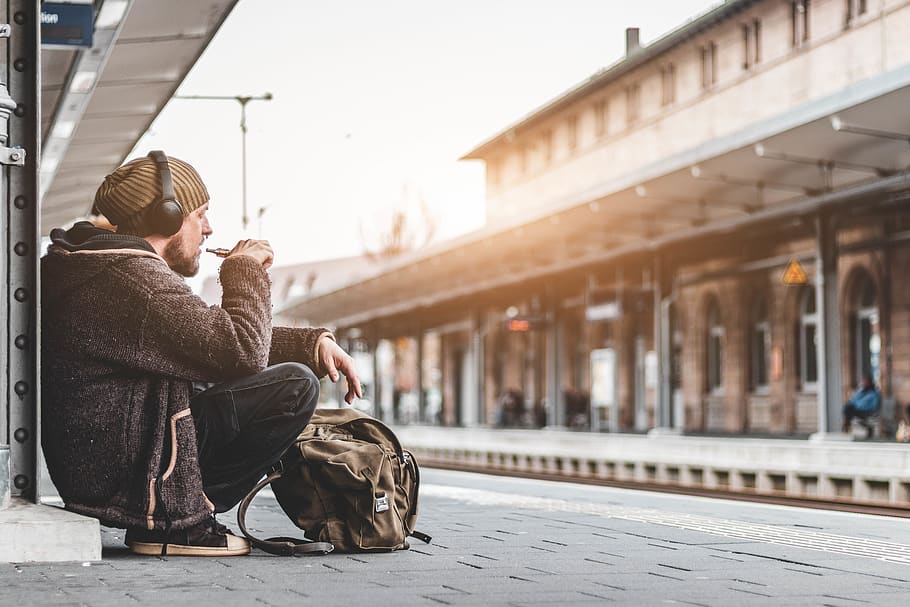 man sitting on train station, two people, adult, young adult HD wallpaper