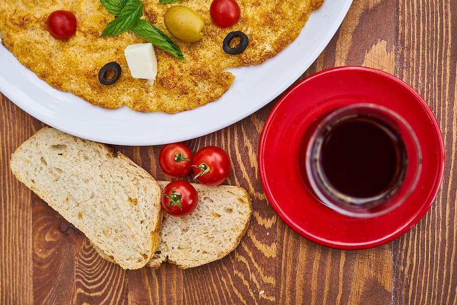 Flat Lay Photo of Bread on Brown Surface, basil, black olives HD wallpaper