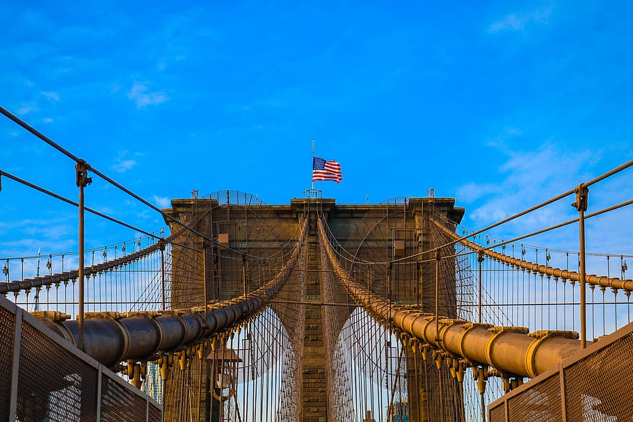 suspension bridge under blue sky, flag, building, adventure, travel HD wallpaper