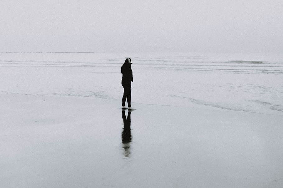 person on seashore, human, standing, silhouette, nature, outdoors HD wallpaper