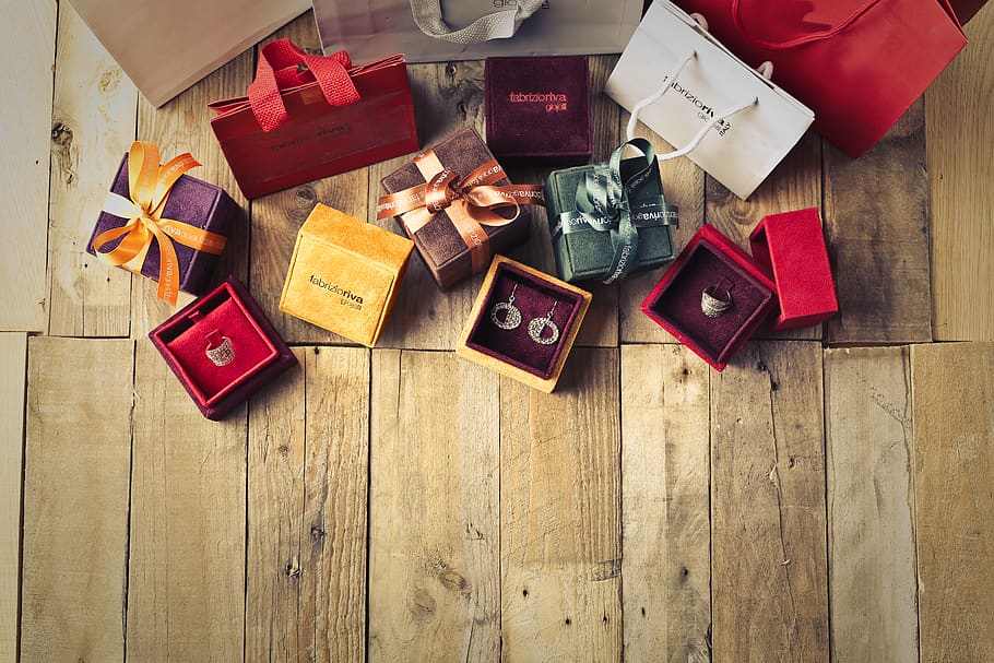 Assorted Gift Boxes on Brown Wooden Floor Surface, background HD wallpaper