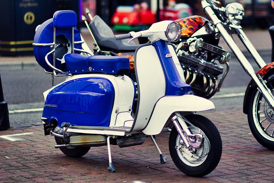 white and blue motor scooter parking beside cruiser motorcycle, HD wallpaper