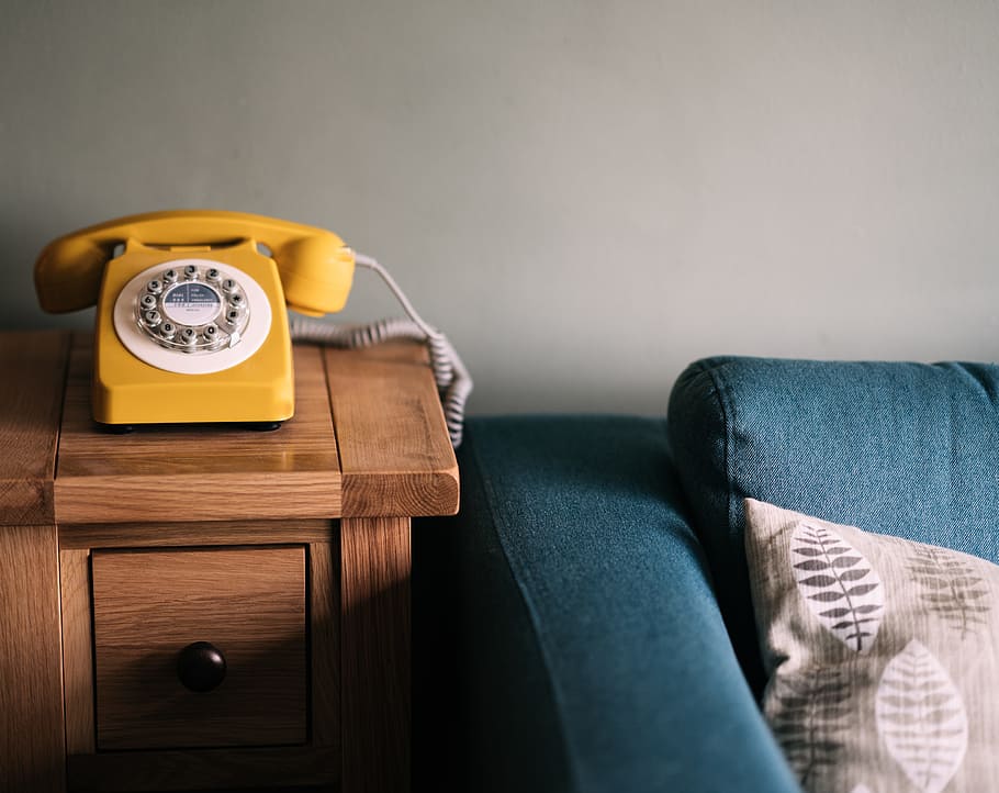 photo of yellow rotary telephone near blue sofa, table, cushion, HD wallpaper