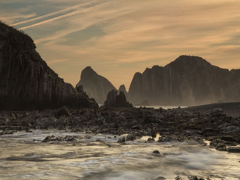dawn, sunrise, clouds, beach, rocks, sky, water, beauty in nature HD wallpaper