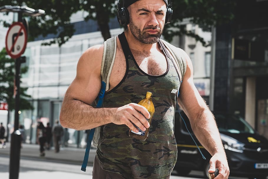 man holding brown bottle, person, human, people, male, street HD wallpaper