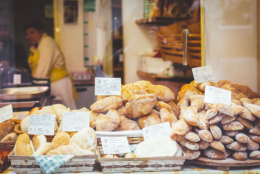 assorted breads display on table, human, person, shop, bun, summer HD wallpaper