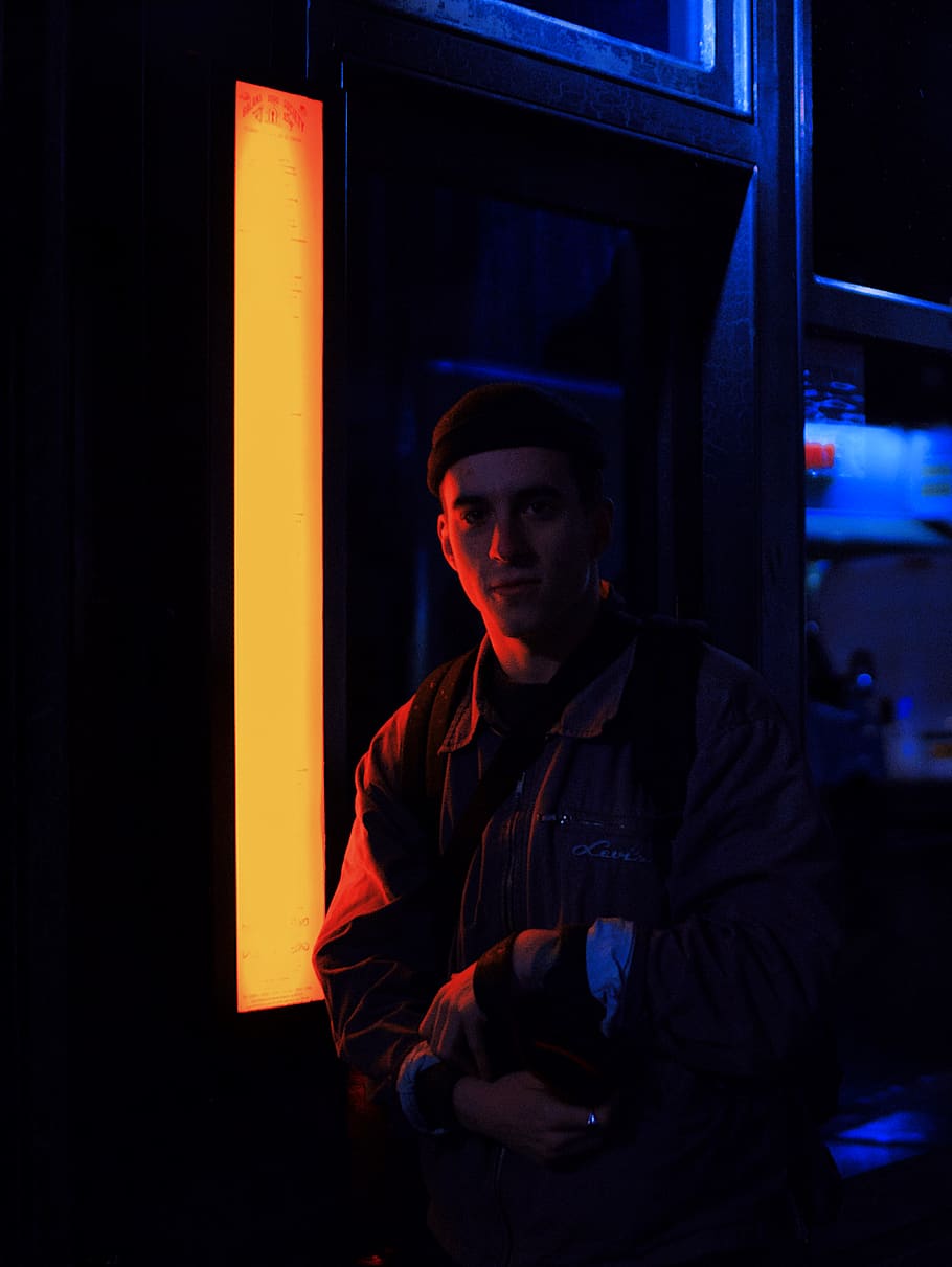man standing beside street light, person, human, neon, london, HD wallpaper