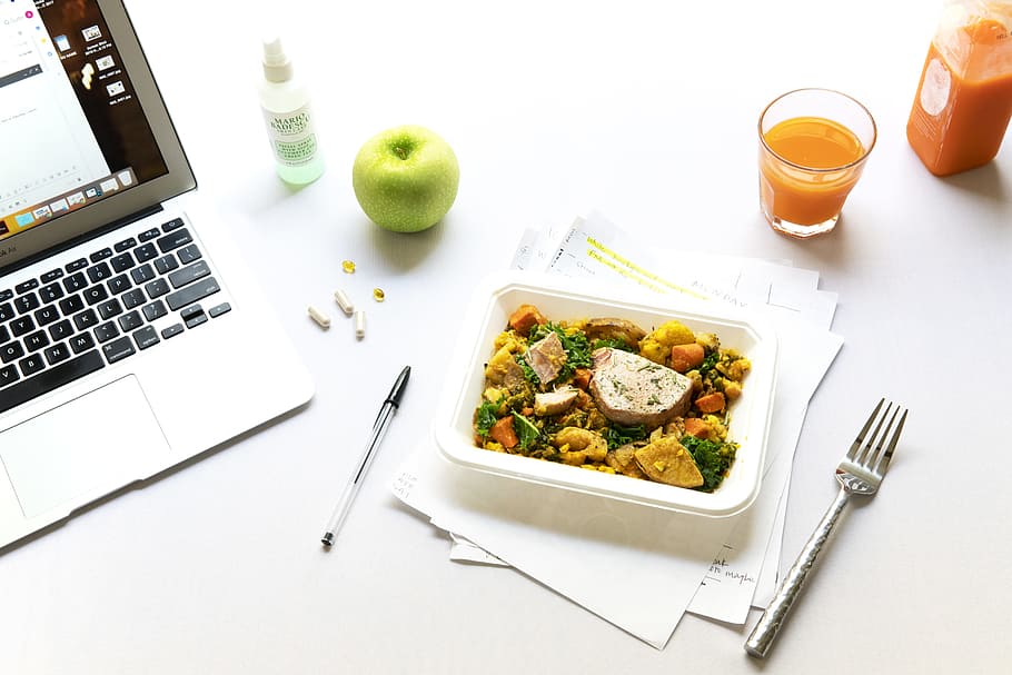 vegetables on plate beside fork and laptop, lunch, office, meal HD wallpaper