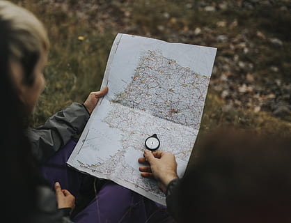 Person Looking At The Map And Using Compass, ballachulish, destination HD wallpaper