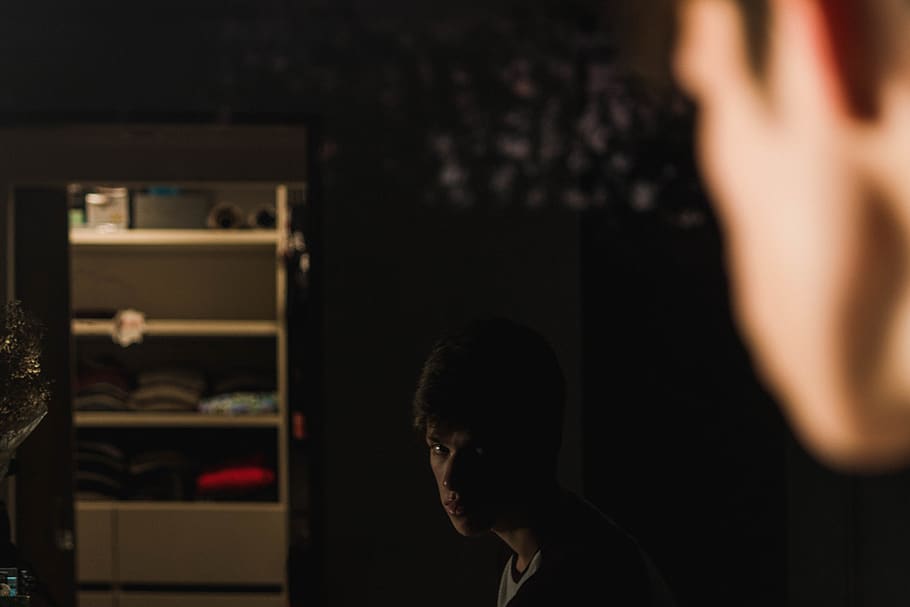 man facing mirror, furniture, person, human, cupboard, closet HD wallpaper