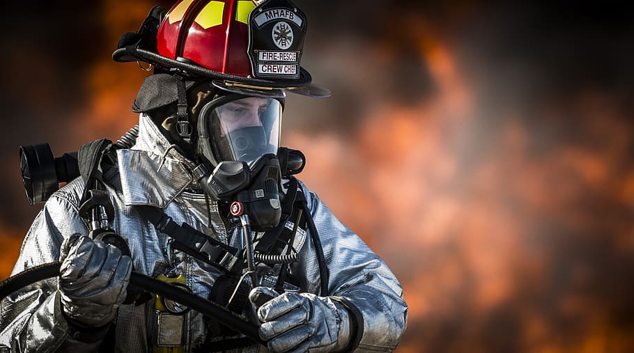 Shallow Focus Photography of Fireman, breathing apparatus, dangerous