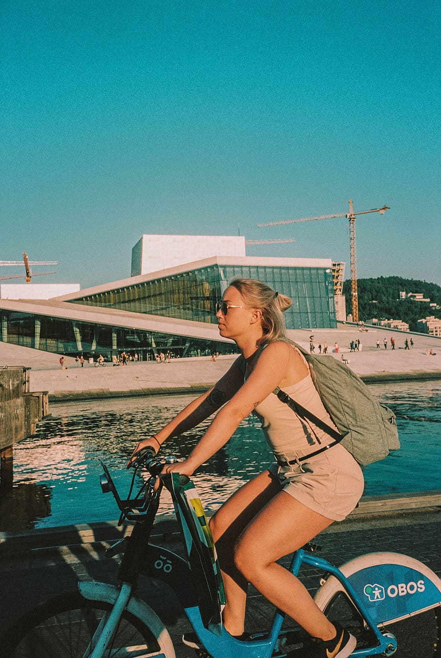 woman riding a bicycle, water, sky, transportation, real people HD wallpaper
