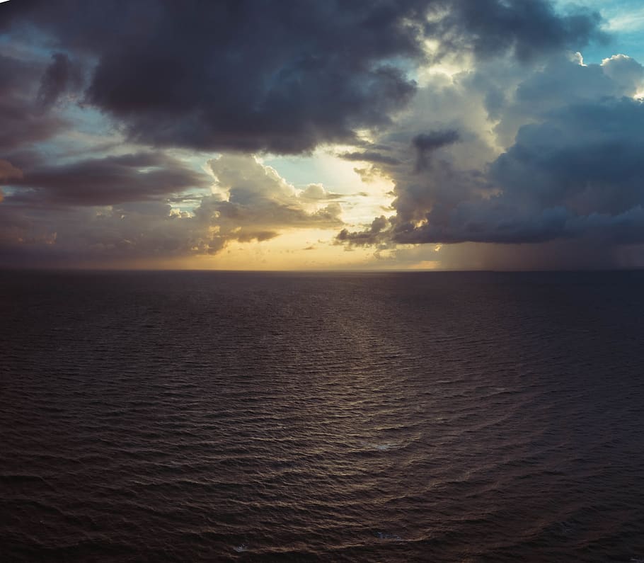 Calm Body of Water With Nimbus Clouds Background Photography HD wallpaper