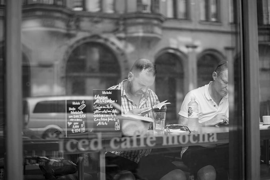 man reading books inside the building, person, sitting, human HD wallpaper