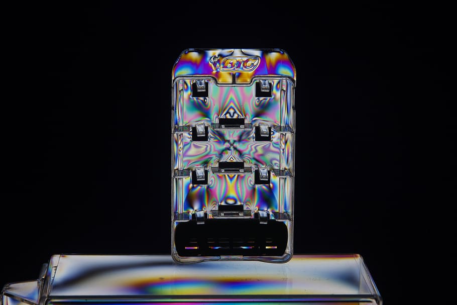 rectangular iridescent case, black background, studio shot, indoors HD wallpaper