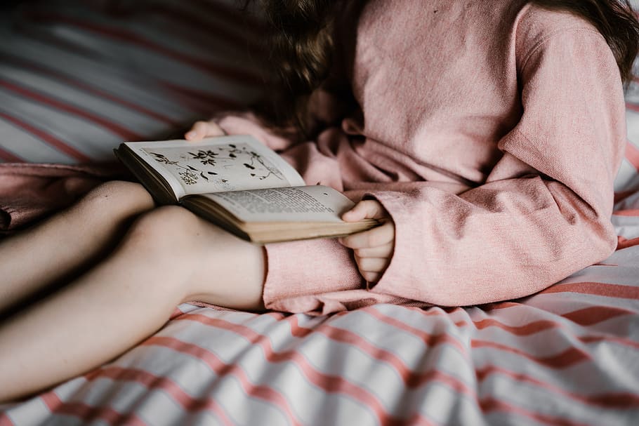 woman reading book on white and red textile, kid, bed, vintage HD wallpaper
