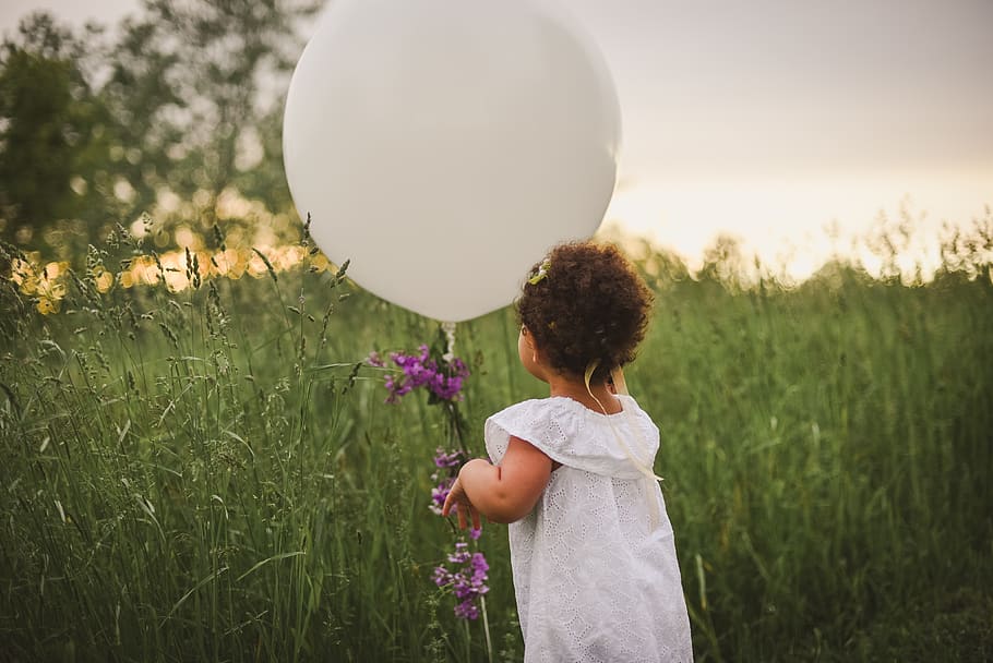 Toddler Holding Balloon, child, field, fun, girl, grass, kid HD wallpaper