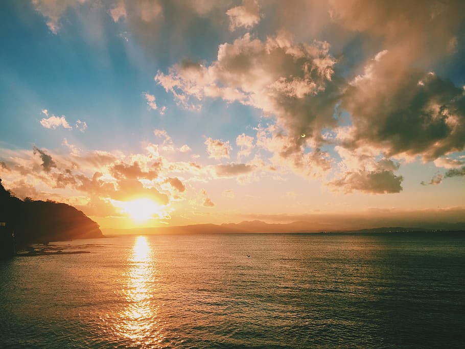 Sunset By The Ocean , clouds, dawn, nature, scenic, sea, seascape HD wallpaper