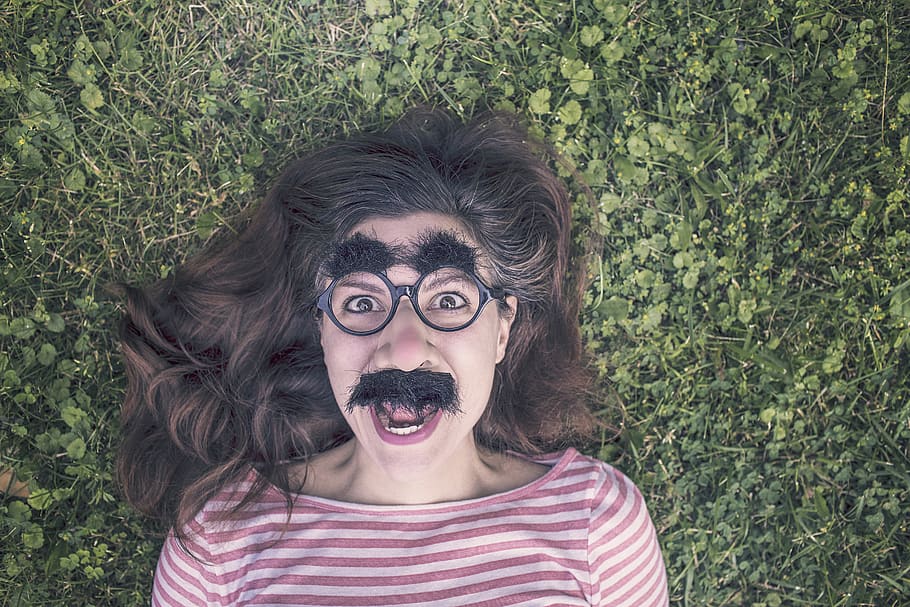 Woman in Red and White Striped Top Lying on Green Grass, crazy HD wallpaper