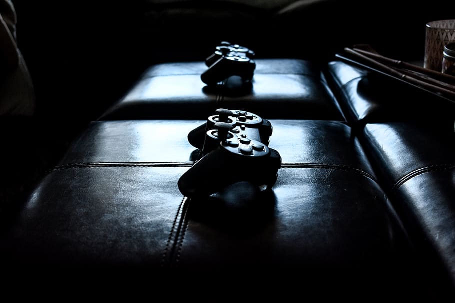 two black controllers, indoors, close-up, table, no people, still life HD wallpaper