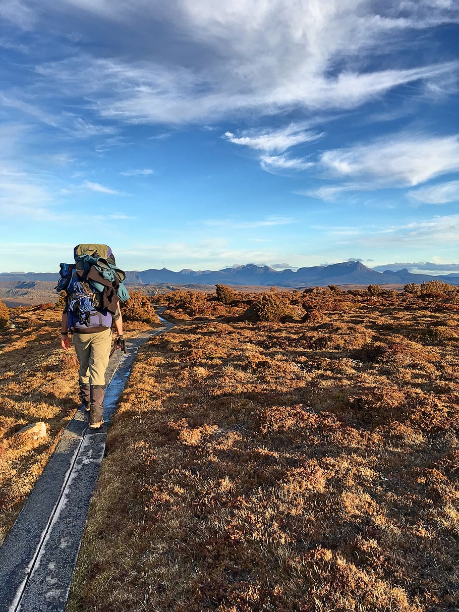 Photo of Man Walking , adult, adventure, backpack, clouds, daylight HD wallpaper
