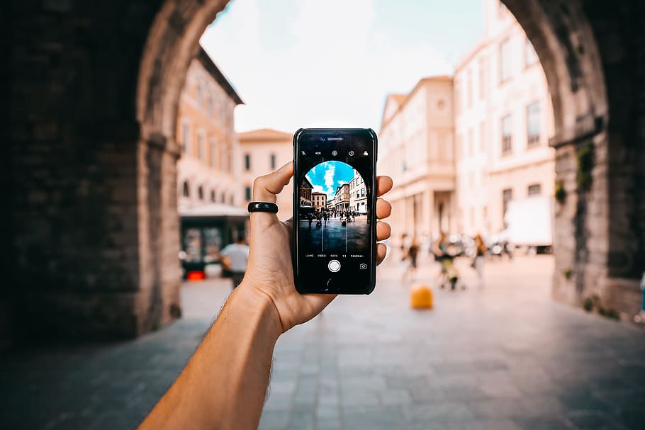 Person Holding Black Android Smartphone, arch, architecture, blur HD wallpaper