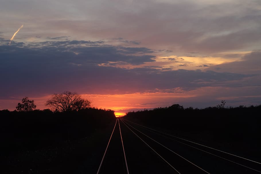 train tracks, sunset, three tracks, sky, cloud - sky, rail transportation HD wallpaper
