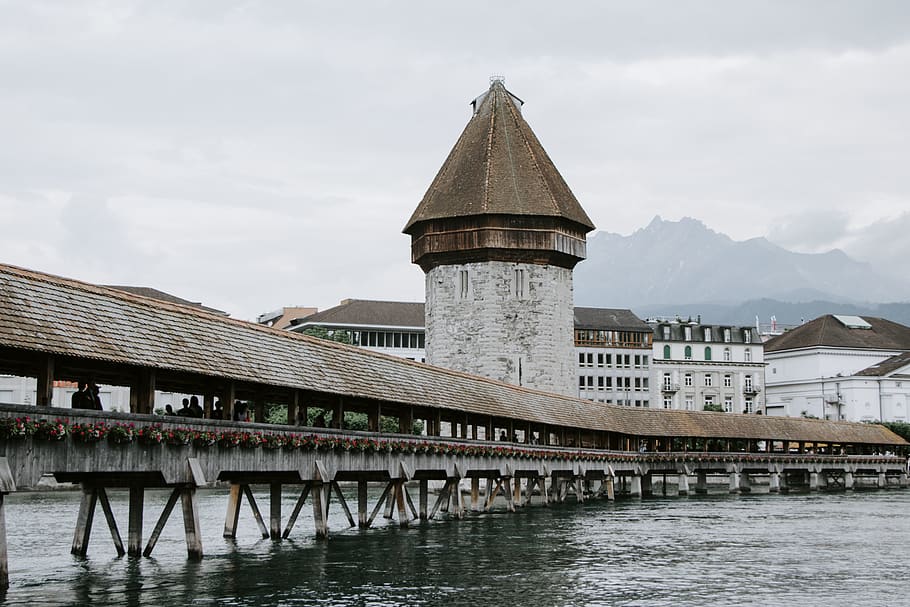 brown boardwalk, water, spire, steeple, tower, building, architecture HD wallpaper