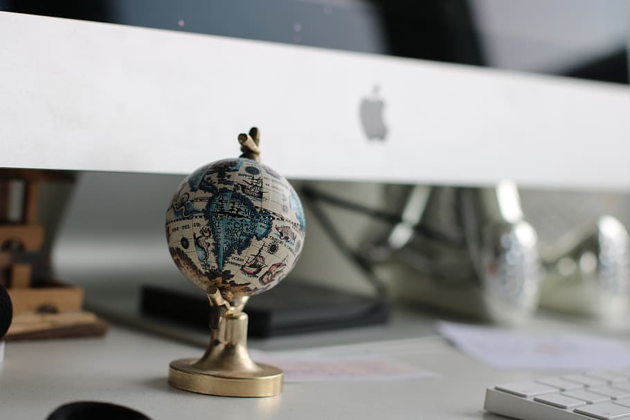 Globe On Top Of White Wooden Table, cute, desk, imac, macro, miniature HD wallpaper