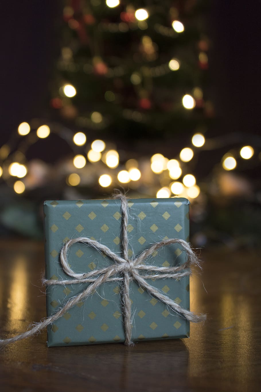 HD wallpaper: Close-up Photo of Green Gift Box on Brown Wooden Surface,  blurred background | Wallpaper Flare