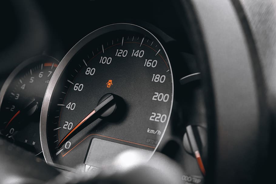 Luxury car interior details. Speedometer and steering wheel, number HD wallpaper