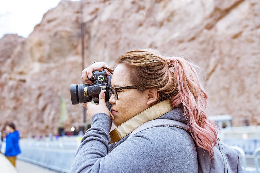 Woman Wearing Gray Jacket Using Black Dslr Camera, adult, backpack HD wallpaper