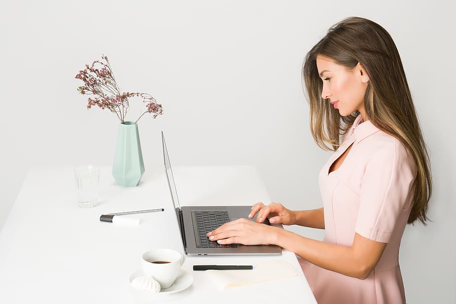 Woman in Pink Dress Using Laptop Computer, attractive, beautiful HD wallpaper