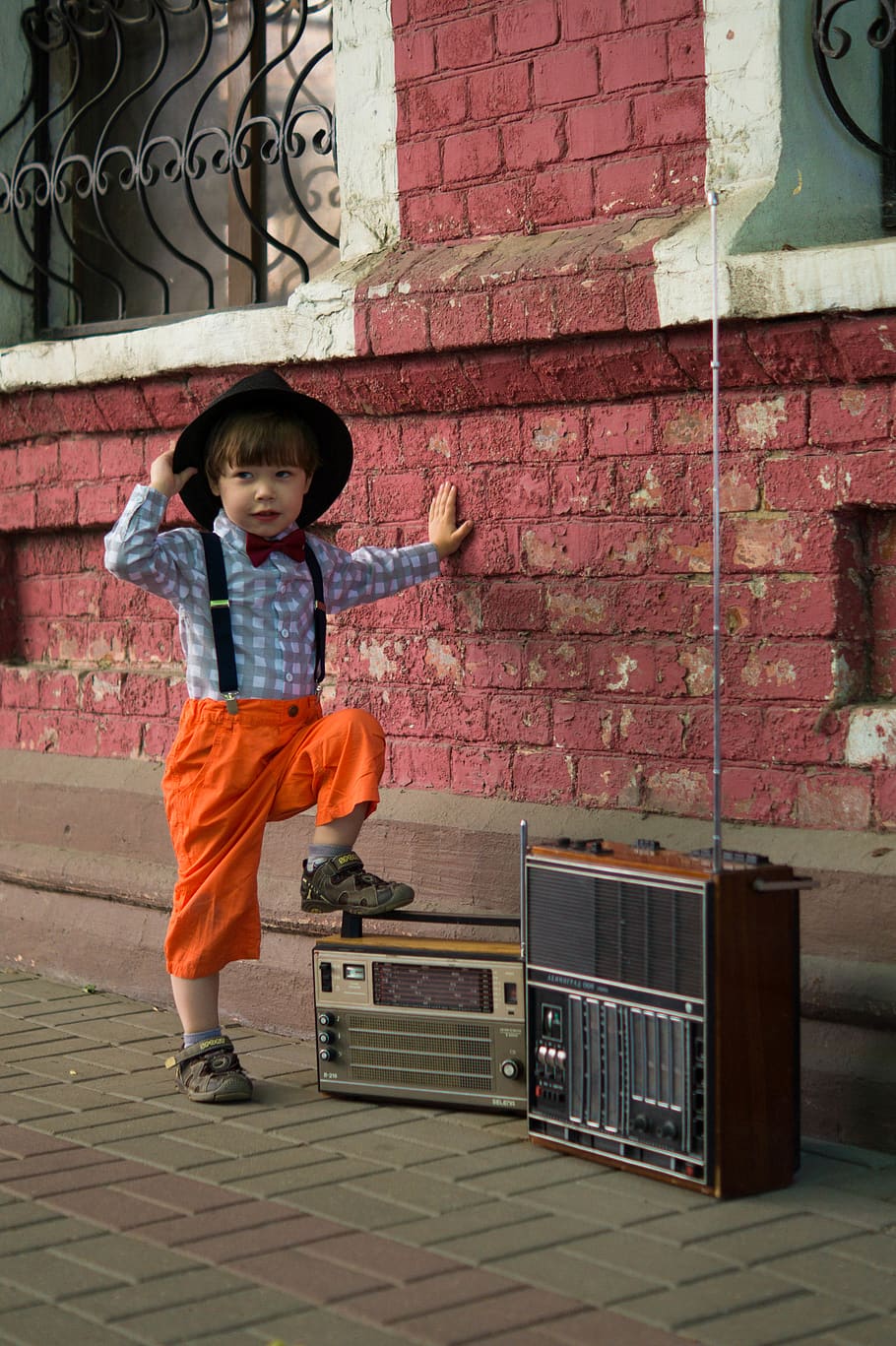 Boy Stepping On Boombox, brick wall, child, cute, fashion, kid HD wallpaper