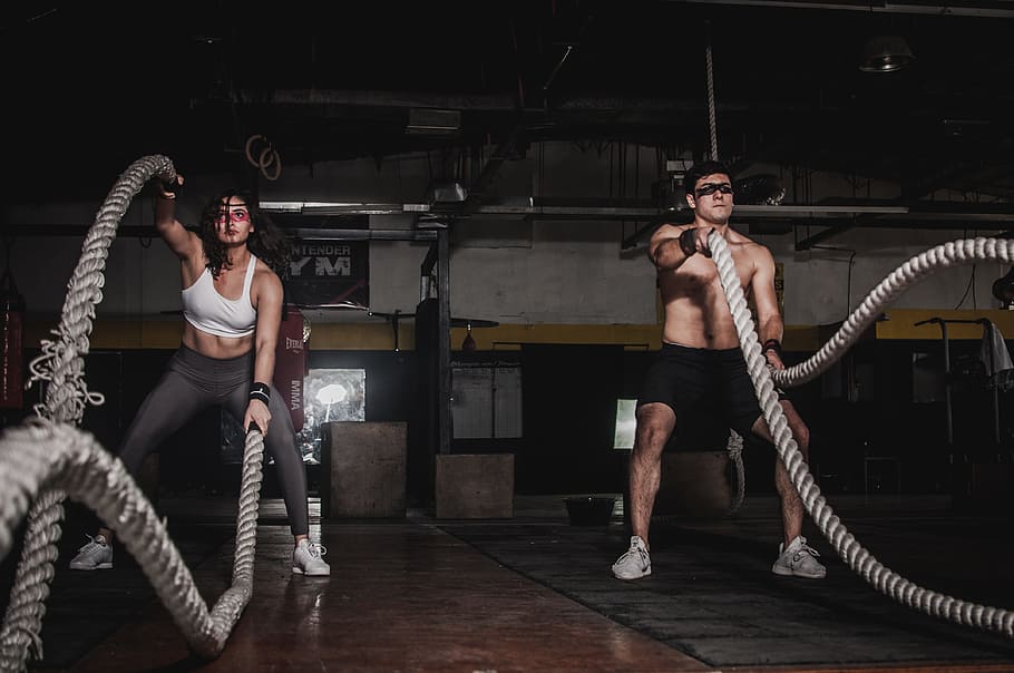 Man And Woman Holding Battle Ropes, energy, exercise, gym, indoors