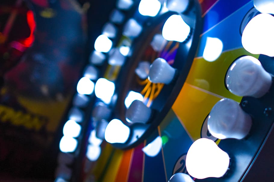 Closeup Photo of Bulbs, arcade, blur, colors, focus, games, gaming HD wallpaper